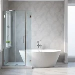 Admire elegant shower doors complemented by sleek fixtures in a modern, stylish bathroom.