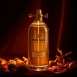 Showcasing the Montale arabians tonka fragrance bottle with saffron and tonka beans in an elegant setting.