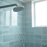 Experience elegant showers in a luxurious bathroom with sleek designs and bright natural light.